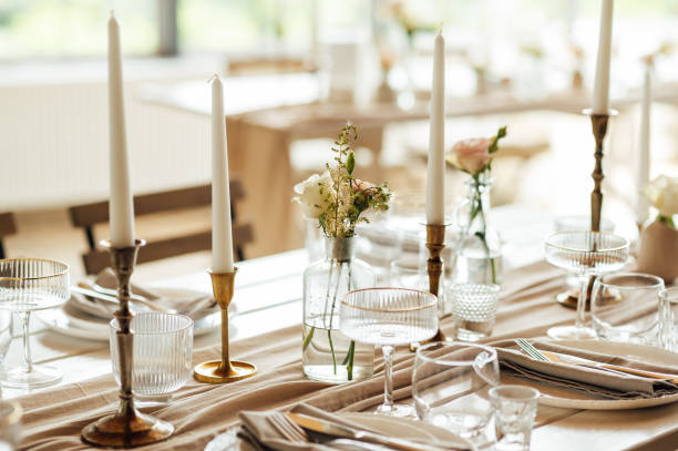 istock Elegant neutral coloured wedding table scape with flowers and candles 2172426167