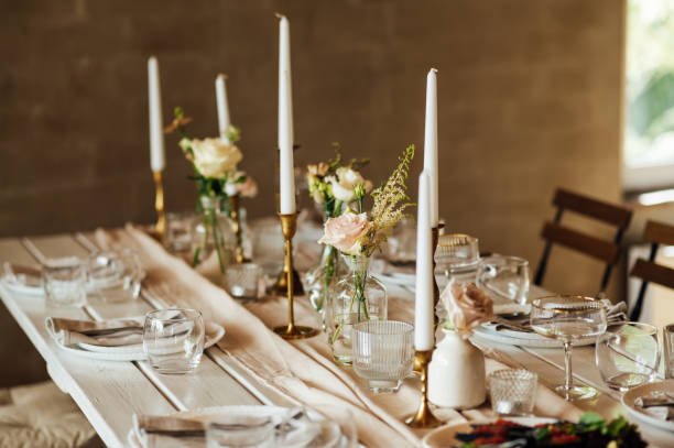 istock Elegant neutral coloured wedding table scape with flowers and candles 2172426225
