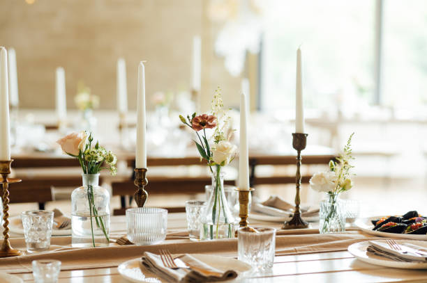 istock Elegant neutral coloured wedding table scape with flowers and candles 2172426680