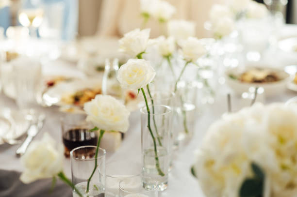 Gala diner table waiting for guests. Food and drink establishment. Hollyday table setting.