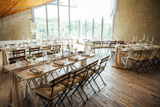 istock Elegant neutral coloured wedding table scape with flowers and candles 2172426786