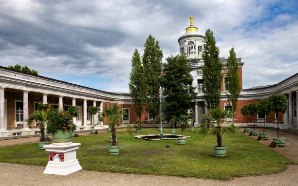 Potsdam, Germany, July 5, 2024: View of the Marble House (German: Marmorpalais) from the 18th century situated in the public park New Garden. It used to be a summer residence of the king of Prussia Frederick William II.