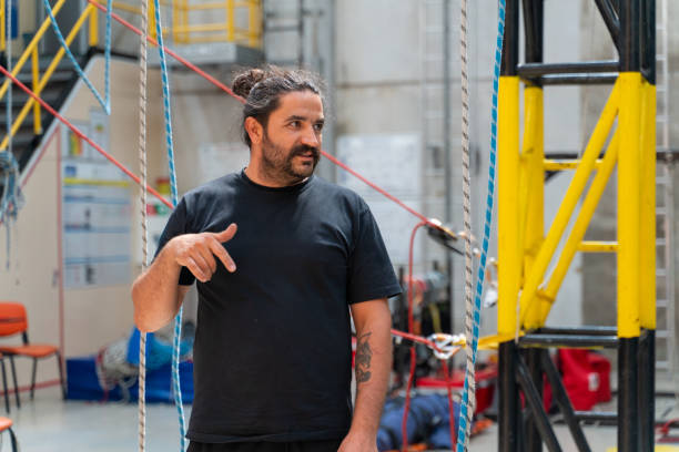 istock Leader who informs his employees about working at height and climbing 2172431929
