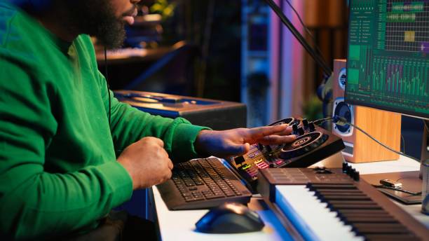 istock Talented musician creating new soundtracks on mixing console 2172432592