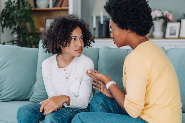 istock Mother and son talking at home. 2172434131