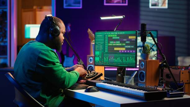 istock Confident music composer mixing sounds on digital audio software 2172436524