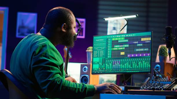 istock Producer composing new track with electronic gear in his home studio 2172439016