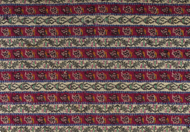 istock Turkish traditional woven fabric with red, white and black geometric patterns. Horizontal close-up. 2172440625