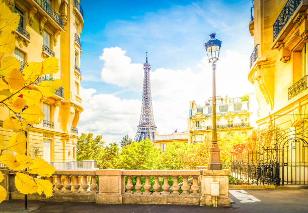 istock eiffel tour and Paris street 2172444362