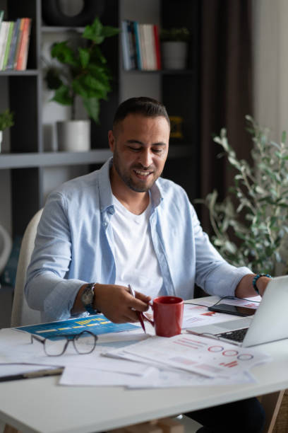 istock Concentrated smart 30s young male manager working in modern office. 2172452283