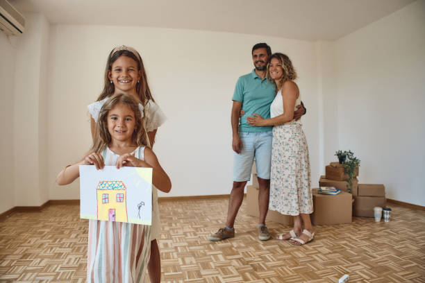 istock Family moving into new home 2172453625