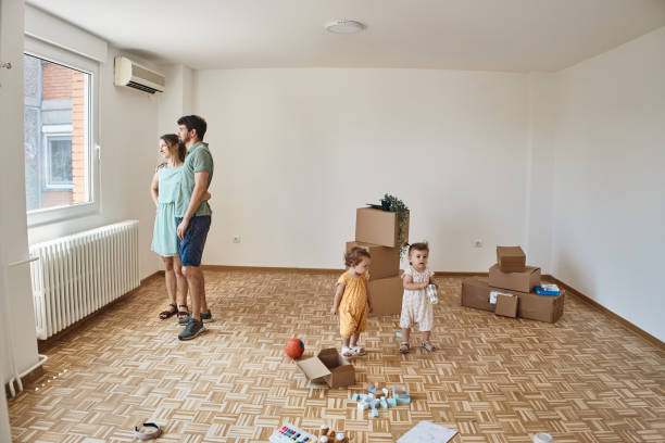 istock Family moving into new home 2172454213