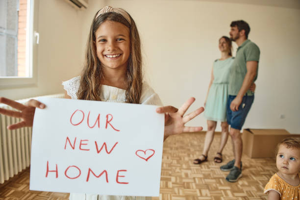 istock Family moving into new home 2172454271