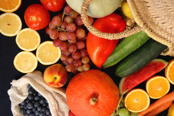istock Straw Bag And Healthy Produce On Dark Background 2172455980