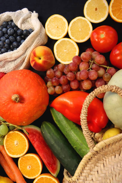 istock Straw Bag And Healthy Produce On Dark Background 2172455989