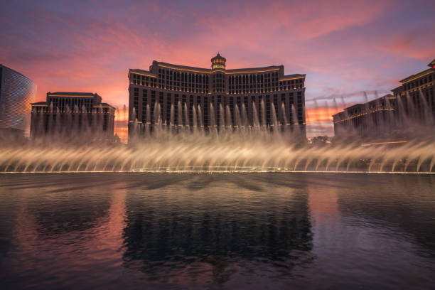 Las Vegas, USA - July 27th, 2011: A large dancing water fountain synchronized to music located on the Las Vegas Strip in the Paradise area by the Bellagio Hotel along with the Paris Hotel and the replica of the Eiffel Tower.