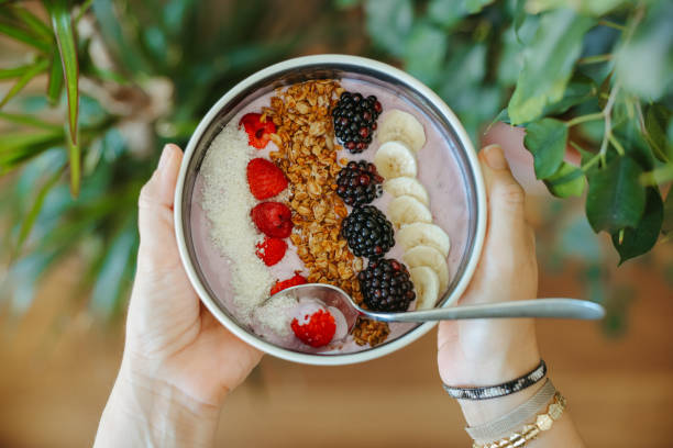 istock Smoothie bowl with fresh berries and granola 2172458005