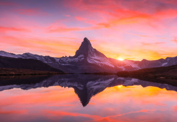 istock Matterhorn peak on Stellisee lake 2172468590