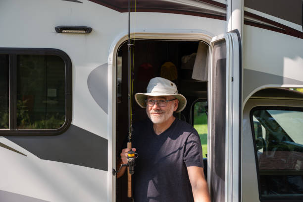 istock Mature man getting out of motorhome 2172473652