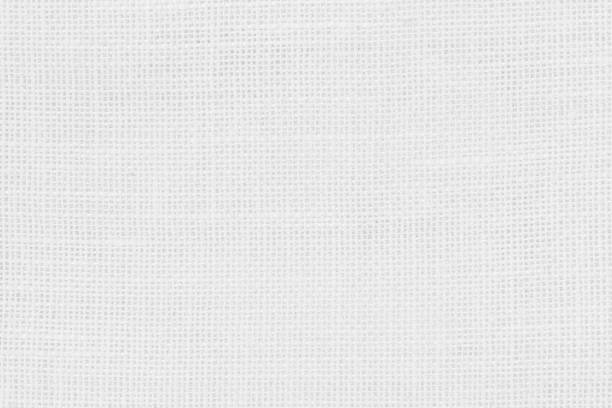 istock Jute hessian sackcloth woven texture pattern background in light white color textile. White canvas fabric, linen cotton cloth rough texture background of watercolour paper craft blank cardboard empty. 2172479514