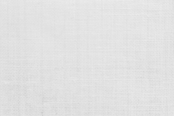 istock Jute hessian sackcloth woven texture pattern background in light white color textile. White canvas fabric, linen cotton cloth rough texture background of watercolour paper craft blank cardboard empty. 2172479522