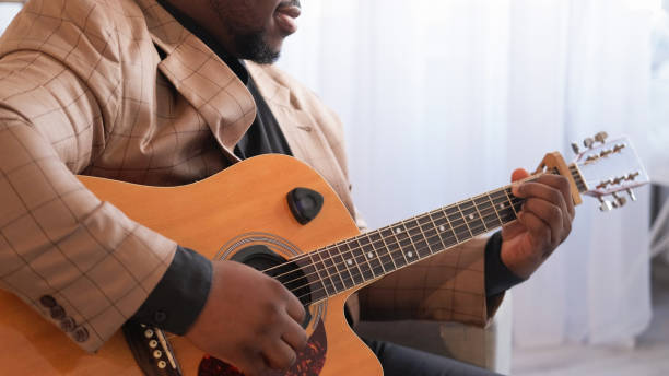istock Guitar artist music practice man hands string home 2172479840