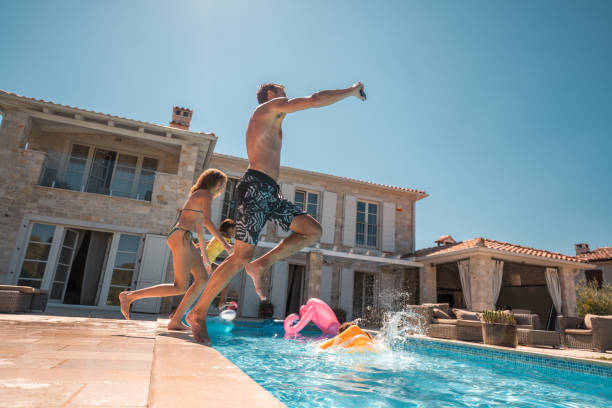 istock Multi-Generational Family Fun in the Pool 2172483170