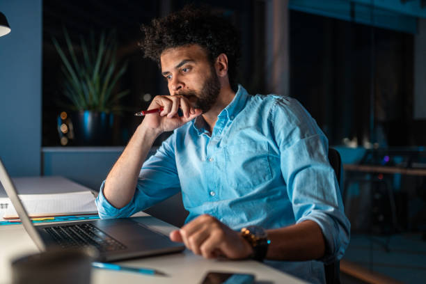 istock Focused Middle Eastern Businessman Working Overtime 2172483315