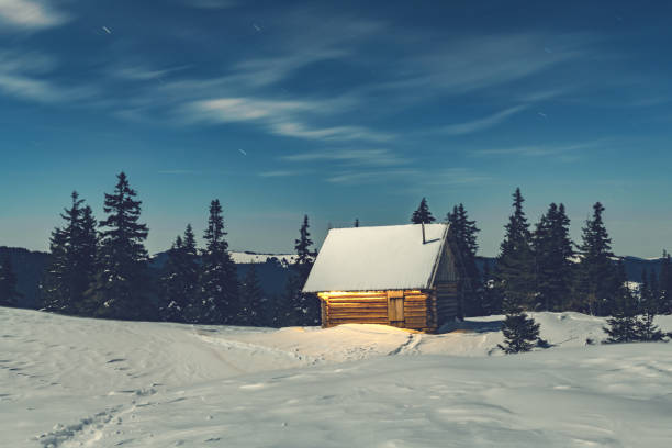istock Fantastic landscape with snowy house 2172484314