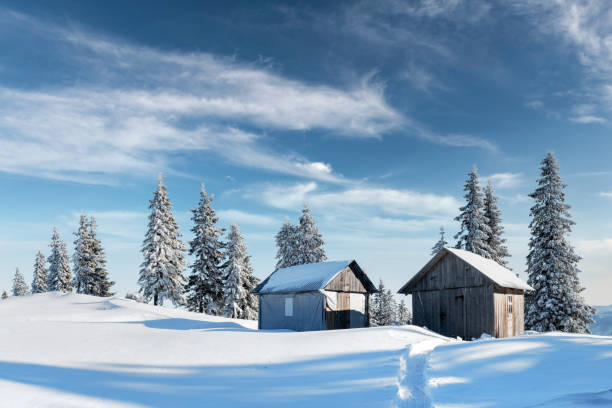 istock Fantastic landscape with snowy house 2172498756