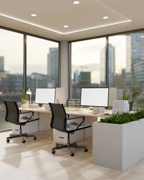 istock A modern office in a skyscraper features computers on desks by the window with a stunning view. 2172509454