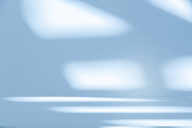 istock Studio style background wall decoration presentation uses white and blue tones. with shadows cast from a nearby window, concept creating a decorative 2172510030