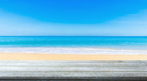 istock beautiful Empty white wood table with luxury clean beach background 2172511475