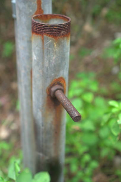istock Weathered Metal Fence Posts 2172513852