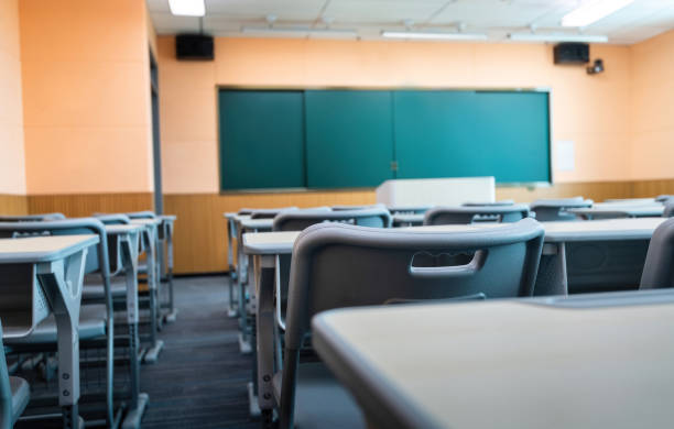 istock Modern classroom with desks and chairs 2172514347