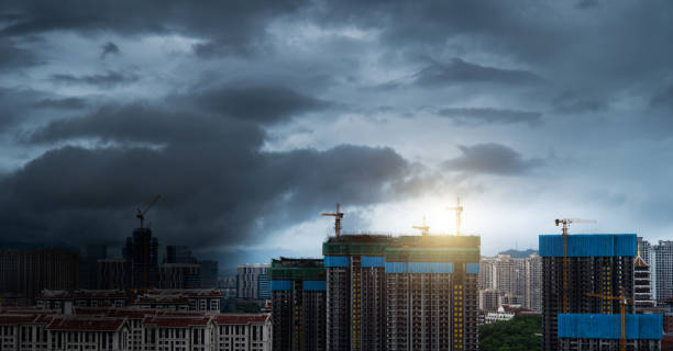 istock Dark stormy clouds over the city 2172514908