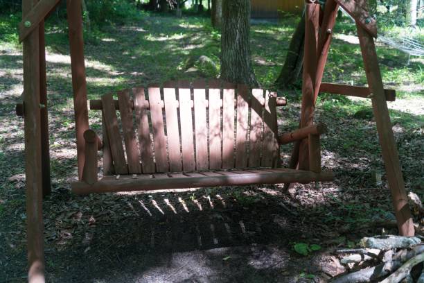 istock A two-seater swing in the shade 2172518380