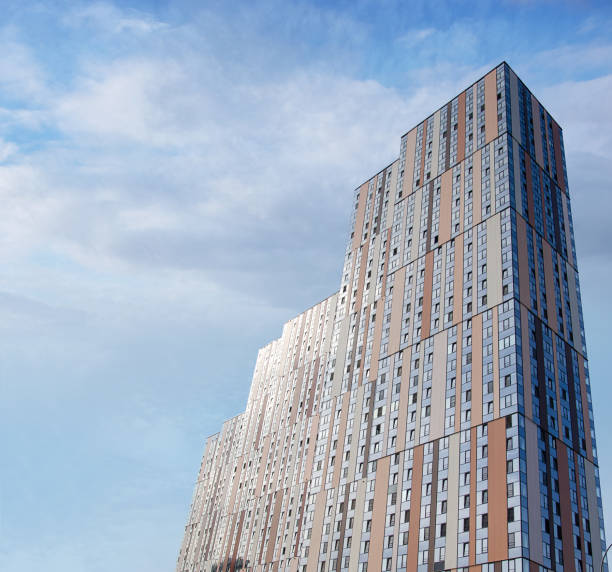 istock A tall building with a blue and brown facade 2172518498