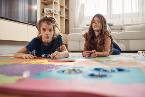istock Playful children in living room 2172522496