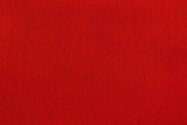 istock Dark red cotton fabric cloth texture background, seamless pattern of natural textile. 2172526828