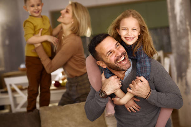 istock Happy family having fun at home. 2172528233