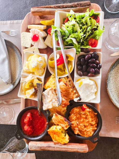 istock Grilled meats and vegetables feast on a wooden platter 2172532866