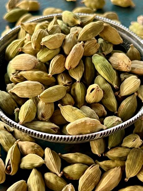 istock Dried Cardamom seeds in a silver bowl. 2172532871