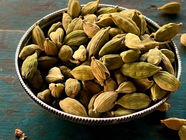 istock Dried Cardamom seeds in a silver bowl. 2172532875