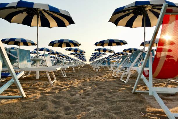 istock Multi-colored beach umbrellas during sunrise in Rimini 2172533649