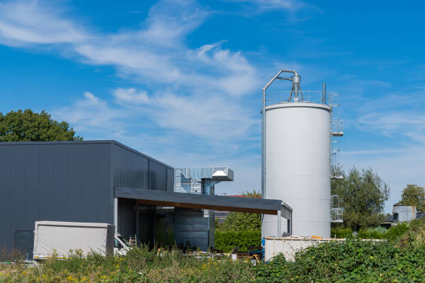 istock Modern industrial facility with silo under clear blue sky 2172534872