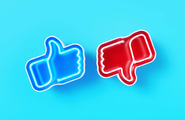 istock Red And Blue Thumbs Up Symbols On Blue Background 2172536005