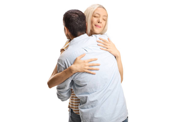 istock Young woman in embrace with a man 2172540299