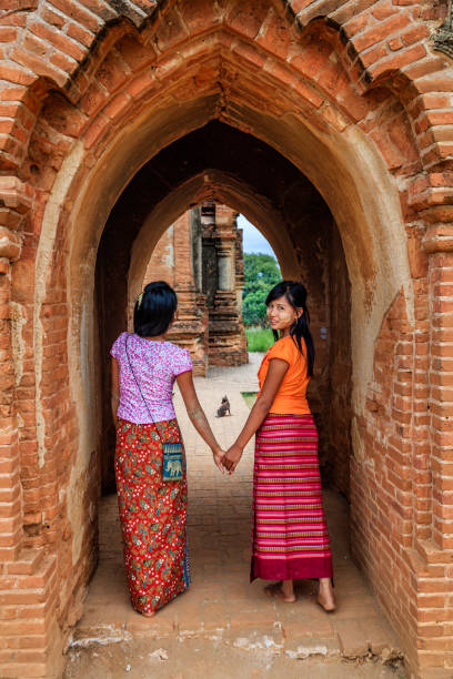 istock Young Burmese girls walking in Bagan, Myanmar 2172542658