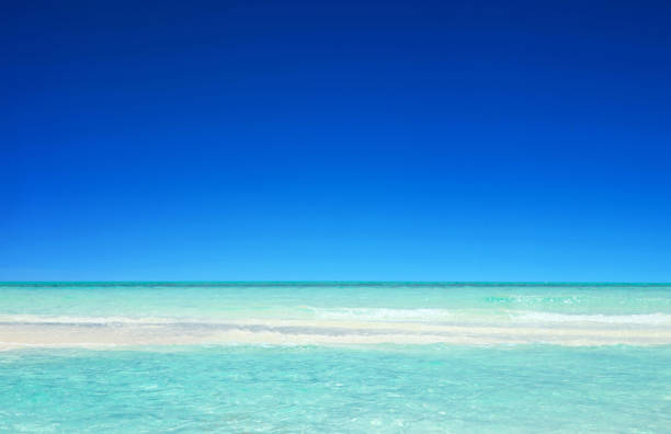 istock Beach and beautiful tropical sea. Blue sunny sea water surface 2172543652